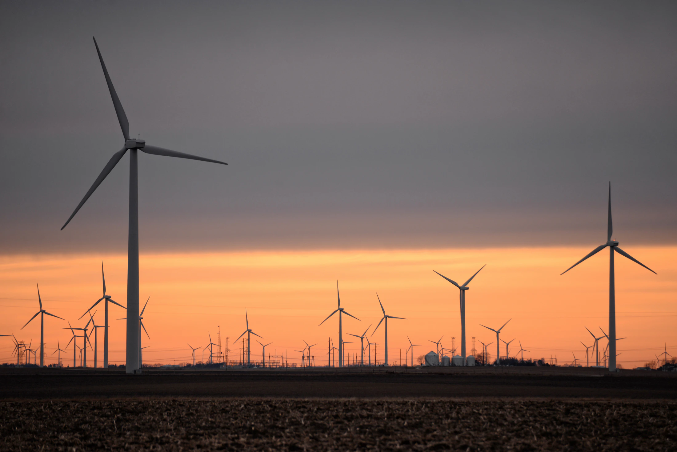 A wind farm stretching across a wide landscape